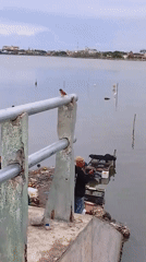 Early morning waterway scenes documented in Lhokseumawe, Indonesia