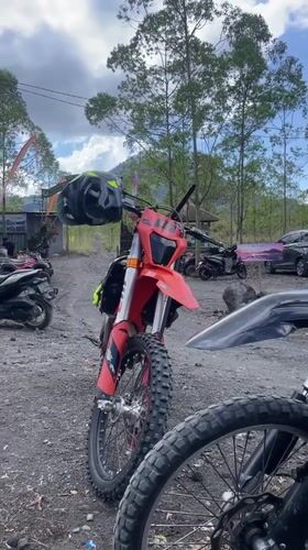 Dirt bikes and riders gathered in Kintamani, Indonesia