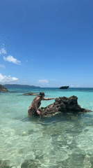 Beach day on Boracay's rocky turquoise shallows