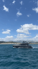 Grey yacht speeds across choppy waters off M'Diq coast
