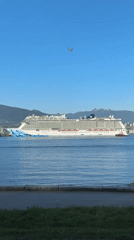 Vancouver waterfront scenes show cruise ship and Lions Gate Bridge