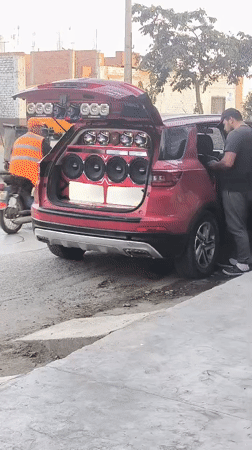 Custom sound system SUV displayed on Trujillo street