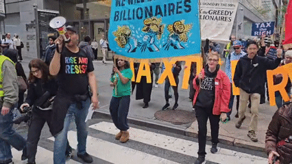 Dozen protesters march near Grand Central demanding billionaire taxes