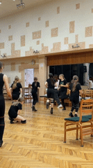 Dance group rehearses routine in Riga studio