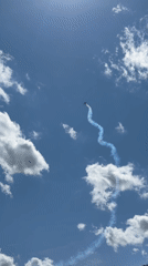 Aerobatic planes trace smoke trails over Cheb airshow