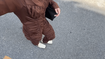 Woman films Seoul street walk, cafe visit