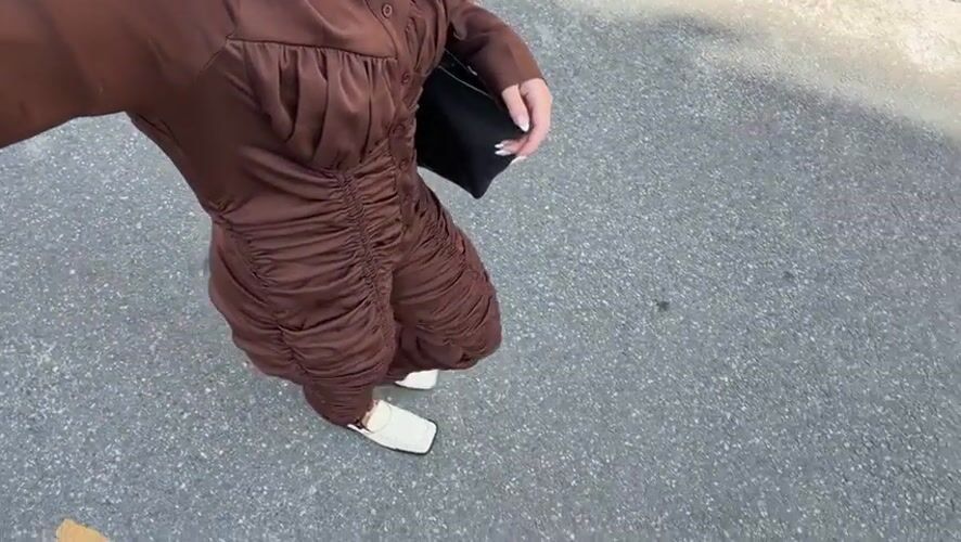 Woman films Seoul street walk, cafe visit