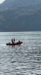 Lakeside afternoon on Lake Como, boats and docks