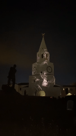 Light show illuminates white tower in Tatarstan, Russia
