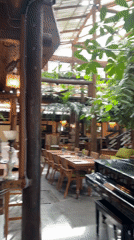 Garden restaurant documented in Mengwi, Indonesia features indoor dining