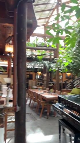 Garden restaurant documented in Mengwi, Indonesia features indoor dining
