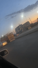Evening traffic flows through Kuchingoro highways at sunset