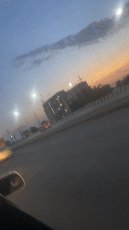 Evening traffic flows through Kuchingoro highways at sunset