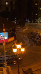 Outdoor film screening in a Las Rozas plaza on a summer night