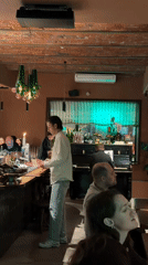 Evening wine dining captured at cozy Moscow restaurant