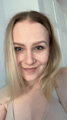 Woman photographed in room with chocolate, window blinds visible