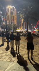 Evening dance gathering at Da Nang Beach boardwalk
