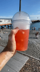 Summer afternoon on Sochi's Black Sea promenade with dining and breakdancing