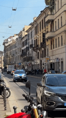 Morning street life documented across central Milan neighborhoods