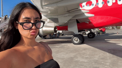 AirAsia aircraft serviced at Kuta airport during morning operations