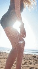 Woman photographed at sunrise on Nesebar beach, Bulgaria