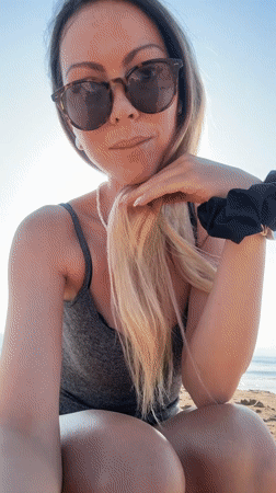 Woman photographed at sunrise on Nesebar beach, Bulgaria
