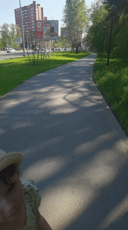 Child enjoys park outing with ice cream in Perm