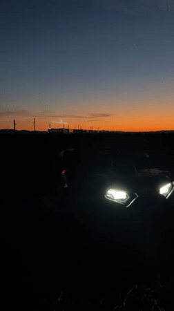 Vehicle spotted at dusk in Bulgarian countryside field