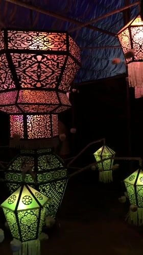 Decorative lanterns with geometric patterns displayed indoors in Matara