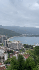 Morning scenes captured in coastal Budva: overcast views, blooming roses