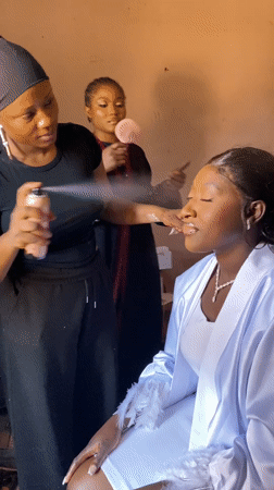 Woman receives beauty preparation for special occasion in Nigeria
