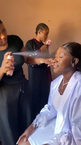 Woman receives beauty preparation for special occasion in Nigeria
