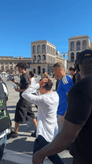 Tourist documents afternoon visit to Milan's Duomo and Galleria