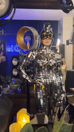 Novosibirsk nightclub party features mirrored dancer, DJ performance
