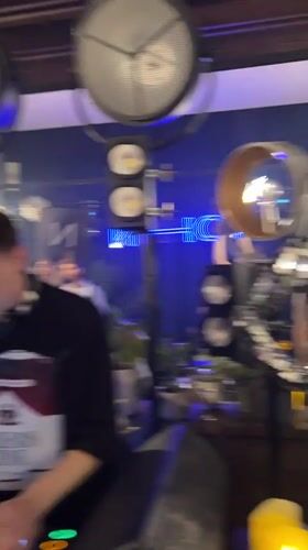 Novosibirsk nightclub party features mirrored dancer, DJ performance