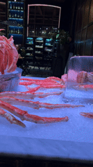 Moscow restaurant showcases elaborate seafood display during busy evening service