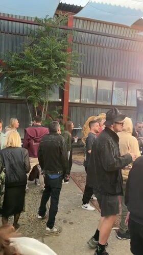 Early morning outdoor gathering documented in Sofia industrial area