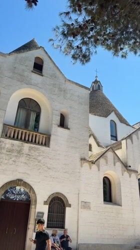 Inside and out: Alberobello's trulli streets and church interior