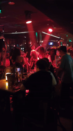 Nightclub scenes captured across Liangjiang venue during evening hours