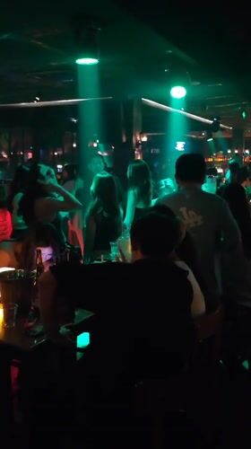 Nightclub scenes captured across Liangjiang venue during evening hours