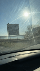 Driver travels sunny road in Burgas, Bulgaria