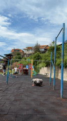 Man exercises at seaside playground in Nesebar, Bulgaria