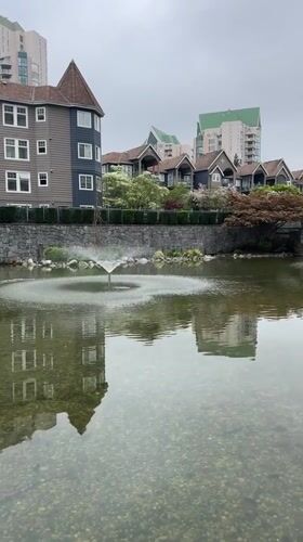 Evening scenes captured in Coquitlam: pond fountains, construction progress