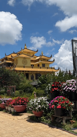 Traditional yellow temple structure documented in Da Lat, Vietnam