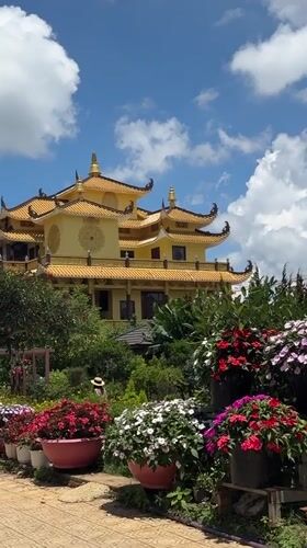 Traditional yellow temple structure documented in Da Lat, Vietnam