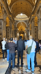 Tourists visit ornate basilica in Vatican City
