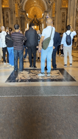 Tourists visit ornate basilica in Vatican City