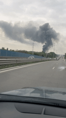 Dark smoke column spotted from highway during morning commute