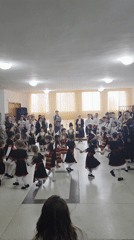 Children perform traditional folk dance in Bulgarian village