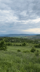 Countryside views captured near Strazhitsa, Bulgaria under cloudy skies